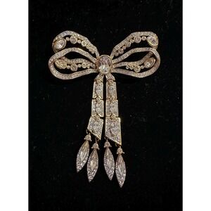 Nolan Miller Articulated Bow Brooch Gold & Rhinestones 3.5"